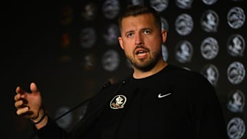 Oct 8, 2025; Charlotte, NC, USA; Florida State head coach Luke Loucks answers questions from the media at The Hilton Charlotte Uptown. Mandatory Credit: William Howard-Imagn Images