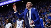 Dec 2, 2025; Lexington, Kentucky, USA; Kentucky Wildcats head coach Mark Pope yells to his players during the first half against the North Carolina Tar Heels at Rupp Arena at Central Bank Center. Mandatory Credit: Jordan Prather-Imagn Images