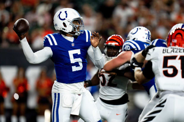 Indianapolis Colts quarterback Anthony Richardson throws the ball in a blue jersey.