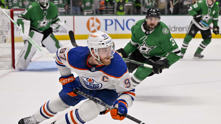 May 25, 2024; Dallas, Texas, USA; Dallas Stars defenseman Chris Tanev (3) and Edmonton Oilers center Connor McDavid (97) in action during the game between the Dallas Stars and the Edmonton Oilers in game two of the Western Conference Final of the 2024 Stanley Cup Playoffs at American Airlines Center. Mandatory Credit: Jerome Miron-USA TODAY Sports