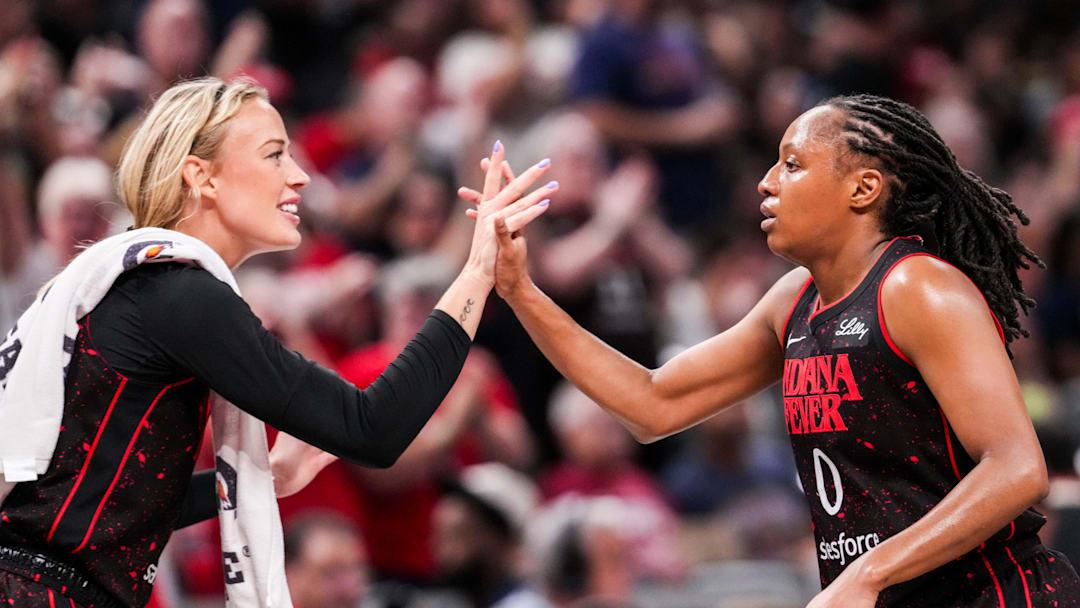 Indiana Fever guard Sophie Cunningham (8) high-fives Indiana Fever guard Kelsey Mitchell (0) on Saturday, Aug. 9, 2025, during a game between the Indiana Fever and the Chicago Sky at Gainbridge Fieldhouse in Indianapolis. Indiana Fever guard Sophie Cunningham (8) high-fives Indiana Fever guard Kelsey Mitchell (0) on Saturday, Aug. 9, 2025, during a game between the Indiana Fever and the Chicago Sky at Gainbridge Fieldhouse in Indianapolis.