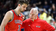 Saint Mary's senior Augustas Marciulionis (left) and head coach Randy Bennett (right).