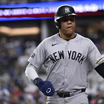 Sep 2, 2024; Arlington, Texas, USA; New York Yankees right fielder Juan Soto (22) comes off the field after he scores against the Texas Rangers during the sixth inning at Globe Life Field.