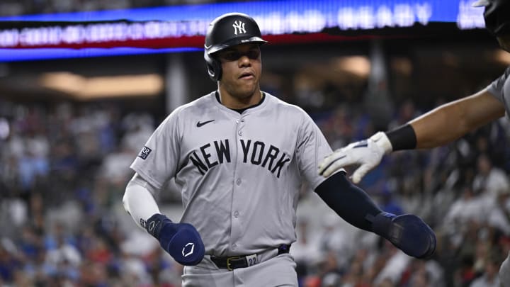 Sep 2, 2024; Arlington, Texas, USA; New York Yankees right fielder Juan Soto (22) comes off the field after he scores against the Texas Rangers during the sixth inning at Globe Life Field.