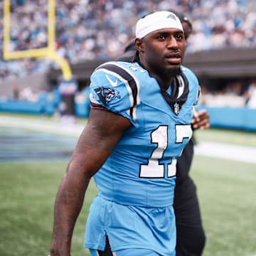 Oct 12, 2025; Charlotte, North Carolina, USA; Carolina Panthers wide receiver Xavier Legette (17) walks off the field during halftime against the Dallas Cowboys at Bank of America Stadium. Mandatory Credit: Scott Kinser-Imagn Images