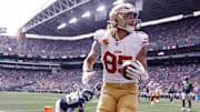 San Francisco 49ers tight end George Kittle celebrates after scoring a touchdown.