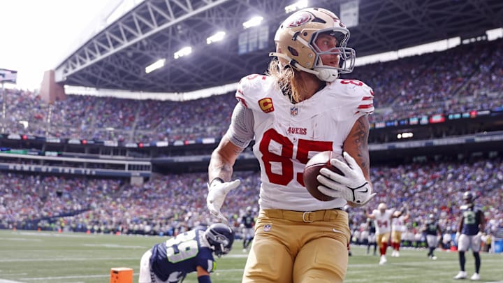 San Francisco 49ers tight end George Kittle celebrates after scoring a touchdown.