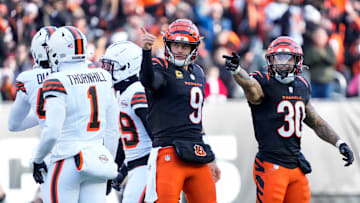 Cincinnati Bengals quarterback Joe Burrow (9) and running back Chase Brown (30) celebrate after a first down run by Burrow in the second quarter of the NFL Week 16 game between the Cincinnati Bengals and the Cleveland Browns at Paycor Stadium in downtown Cincinnati on Sunday, Dec. 22, 2024. The Bengals led 17-0 at halftime.