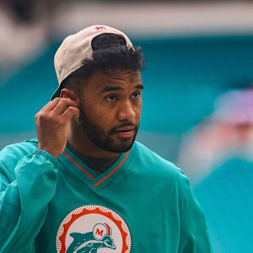 Sep 12, 2024; Miami Gardens, Florida, USA; Miami Dolphins quarterback Tua Tagovailoa (1) walks on the field before the game against the Buffalo Bills at Hard Rock Stadium. 