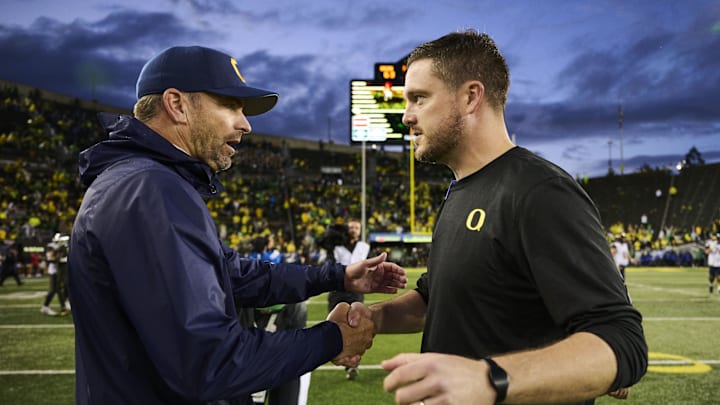 Cal coach Justin Wilcox (left) and Oregon coach Dan Lanning Cal coach Justin Wilcox (left) and Oregon coach Dan Lanning