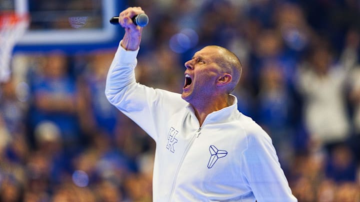 Oct 11, 2024; Lexington, KY, USA; Kentucky Wildcats head coach Mark Pope fist pumps to the crowd during Big Blue Madness at Rupp Arena at Central Bank Center. Mandatory Credit: Jordan Prather-Imagn Images Oct 11, 2024; Lexington, KY, USA; Kentucky Wildcats head coach Mark Pope fist pumps to the crowd during Big Blue Madness at Rupp Arena at Central Bank Center. Mandatory Credit: Jordan Prather-Imagn Images