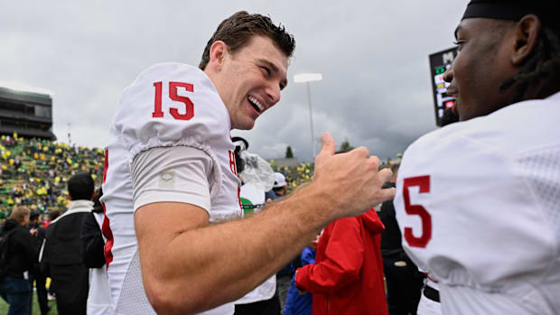 oregon ducks dante moore dan lanning heisman trophy quarterback indiana hoosiers fernando mendoza carson beck john mateer