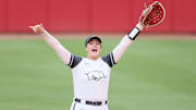 May 25, 2025; Fayetteville, AR, USA; Arkansas Razorbacks first baseman Bri Ellis (77) prior to facing the Ole Miss Rebels in game three of the Fayetteville Super Regional at Bogle Park. Mandatory Credit: Nelson Chenault-Imagn Images
