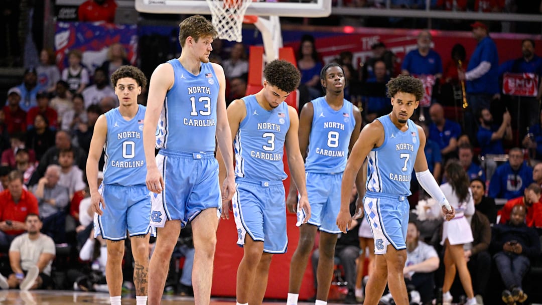 Jan 3, 2026; Dallas, Texas, USA; North Carolina Tar Heels guard Kyan Evans (0) and center Henri Veesaar (13) and guard Derek Dixon (3) and forward Caleb Wilson (8) and guard Seth Trimble (7) come back on the court during the second half against the SMU Mustangs at Moody Coliseum. Mandatory Credit: Jerome Miron-Imagn Images