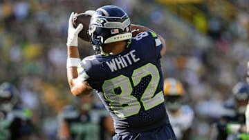 Aug 23, 2025; Green Bay, Wisconsin, USA;  Seattle Seahawks wide receiver Cody White (82) catches a pass before scoring a touchdown during the fourth quarter against the Green Bay Packers at Lambeau Field. Mandatory Credit: Jeff Hanisch-Imagn Images