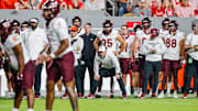 Sep 27, 2025; Raleigh, N.C.; Virginia Tech interim head coach Philip Montgomery shouts to his team during the first half against N.C. State.