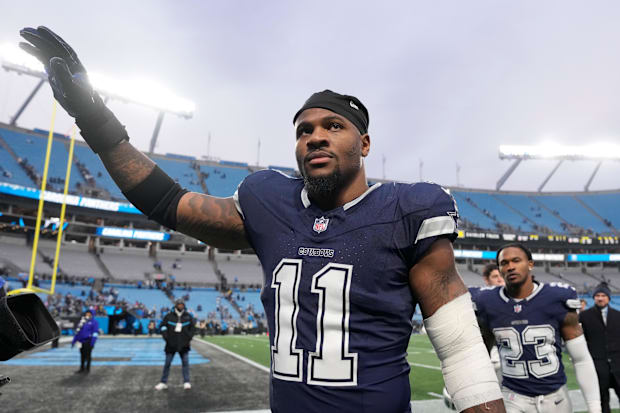 Dallas Cowboys linebacker Micah Parsons walks off the field after the game at Bank of America Stadium.