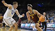 Feb 18, 2025; Los Angeles, California, USA; Minnesota Golden Gophers forward Dawson Garcia (3) drives against UCLA Bruins forward Tyler Bilodeau (34) during the first half at Pauley Pavilion presented by Wescom. Mandatory Credit: Robert Hanashiro-Imagn Images
