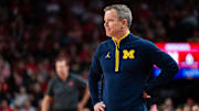 Feb 24, 2025; Lincoln, Nebraska, USA; Michigan Wolverines head coach Dusty May watches during the first half against the Nebraska Cornhuskers at Pinnacle Bank Arena. Mandatory Credit: Dylan Widger-Imagn Images