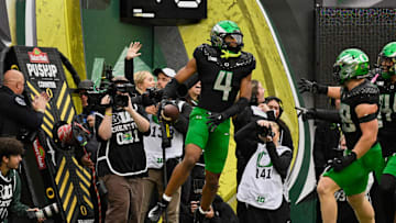 Oct 11, 2025; Eugene, Oregon, USA; Oregon Ducks defensive back Brandon Finney Jr. (4) reacts after intercepting a pass thrown by Indiana Hoosiers quarterback Fernando Mendoza (15) (ntot pictured) and returning it for a touchdown during the fourth quarter at Autzen Stadium. Mandatory Credit: Troy Wayrynen-Imagn Images
