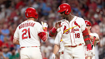 Sep 30, 2023; St. Louis, Missouri, USA; St. Louis Cardinals right fielder Jordan Walker (18) celebrates with his teammate St. Louis Cardinals center fielder Lars Nootbaar (21) for his homerun against the Cincinnati Reds in the second inning at Busch Stadium. Mandatory Credit: Zach Dalin-Imagn Images