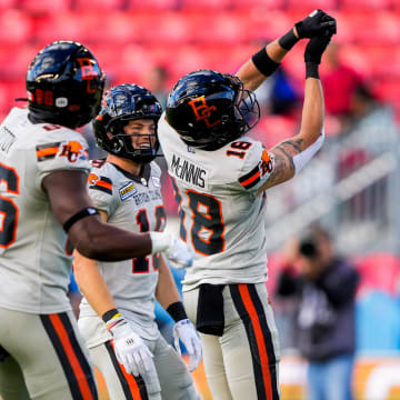 Jun 9, 2024; Toronto, Ontario, CAN; BC Lions wide receiver Justin McInnis (18) celebrates with teammates after scoring a touchdown against the Toronto Argonauts at BMO Field. Mandatory Credit: Kevin Sousa-USA TODAY Sports