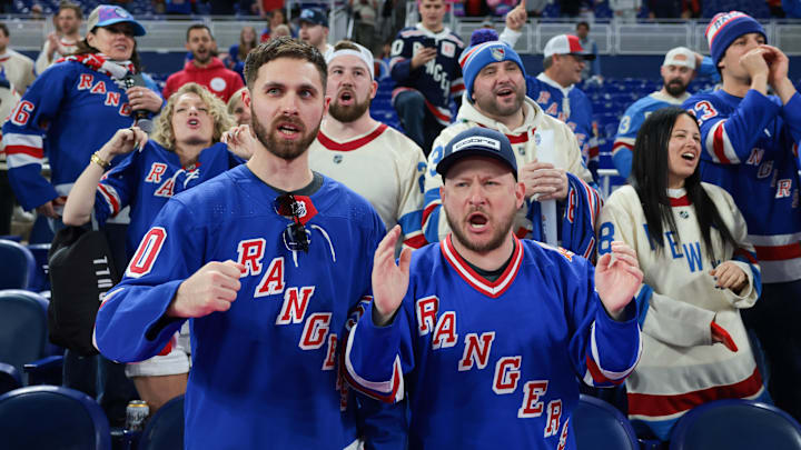 Jan 2, 2026; Miami, Florida, USA; New York Rangers fans cheer after the 2026 Winter Classic ice hockey game against the Florida Panthers at loanDepot Park.