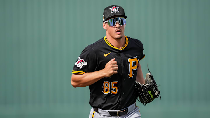 Pittsburgh Pirates top prospect jogs off the field in spring training against the Minnesota Twins.