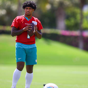 Miami Dolphins quarterback Tua Tagovailoa (1) looks on during mandatory minicamp at Baptist Health Training Complex last year.