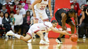 Indiana Hoosiers guard Myles Rice (1) recovers a loose ball in front of Winthrop Eagles forward K.J. Doucet (12) during the first half at Simon Skjodt Assembly Hall.