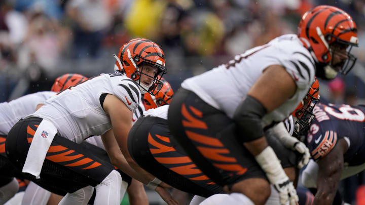 Aug 17, 2024; Chicago, Illinois, USA; Cincinnati Bengals quarterback Rocky Lombardi (4) lines up under center in the third quarter agains the Chicago Bears at Soldier Field. Mandatory Credit: Sam Greene-USA TODAY Sports