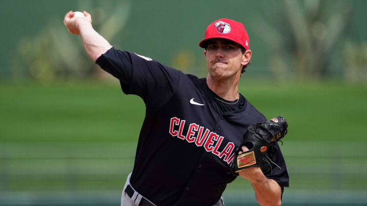 Mar 12, 2024; Surprise, Arizona, USA; Cleveland Guardians starting pitcher Shane Bieber (57) pitches against the Texas Rangers during the first inning at Surprise Stadium. Mandatory Credit: Joe Camporeale-USA TODAY Sports