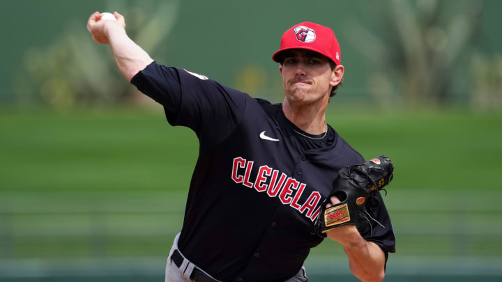 Mar 12, 2024; Surprise, Arizona, USA; Cleveland Guardians starting pitcher Shane Bieber (57) pitches against the Texas Rangers during the first inning at Surprise Stadium.