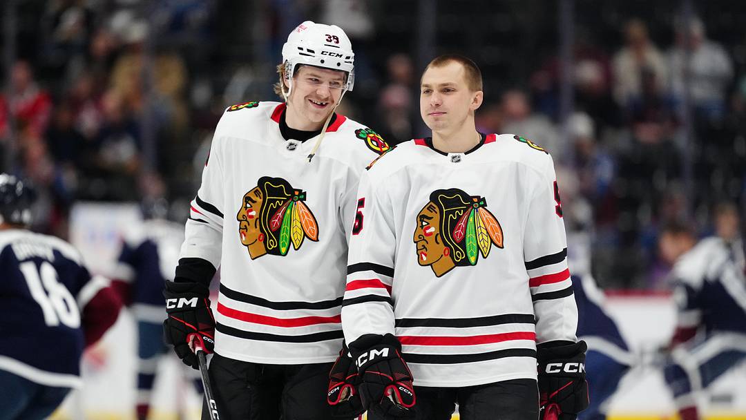 Mar 10, 2025; Denver, Colorado, USA; Chicago Blackhawks defenseman Ethan Del Mastro (38) and defenseman Artyom Levshunov (55) before the game against the Colorado Avalanche at Ball Arena. Mandatory Credit: Ron Chenoy-Imagn Images
