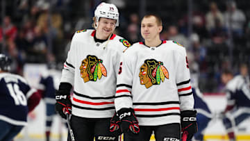 Mar 10, 2025; Denver, Colorado, USA; Chicago Blackhawks defenseman Ethan Del Mastro (38) and defenseman Artyom Levshunov (55) before the game against the Colorado Avalanche at Ball Arena. Mandatory Credit: Ron Chenoy-Imagn Images
