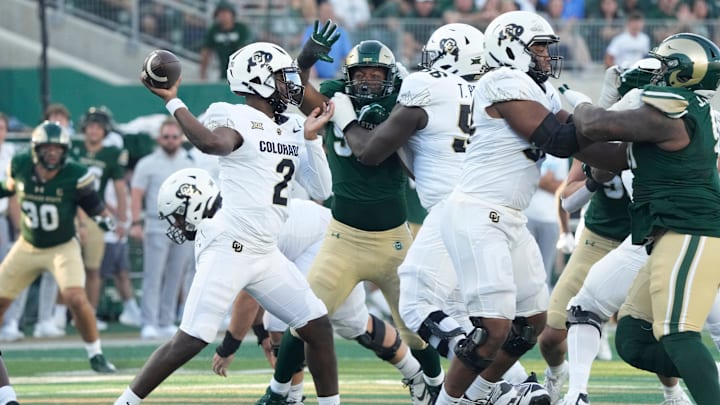 Colorado Buffaloes quarterback Shedeur Sanders shows a pass at Sonny Lubick Field at Canvas Stadium