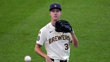 Jul 8, 2025; Milwaukee, Wisconsin, USA;  Milwaukee Brewers pitcher Jacob Misiorowski (32) warms up in the outfield prior to the game against the Los Angeles Dodgers at American Family Field. Mandatory Credit: Jeff Hanisch-Imagn Images
