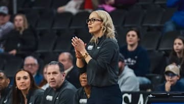 Oral Roberts coach Kelsey Musick on the sidelines for the Golden Eagles in a game.