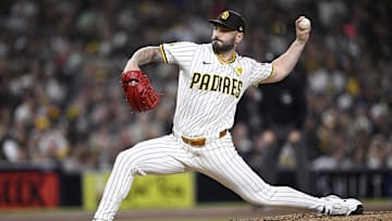 Sep 21, 2024; San Diego, California, USA; San Diego Padres relief pitcher Tanner Scott (66) pitches against the Chicago White Sox during the eighth inning at Petco Park. Mandatory Credit: Orlando Ramirez-Imagn Images