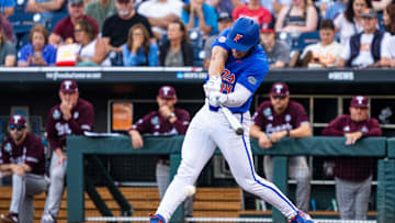 Kansas City Royals top prospect Jac Caglianone hits a home run in college for the Florida Gators.