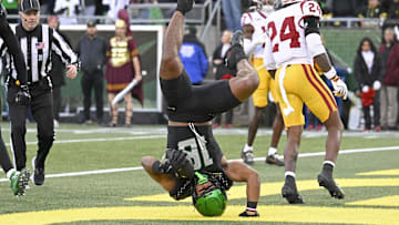 Nov 22, 2025; Eugene, Oregon, USA; Oregon Ducks tight end Kenyon Sadiq (18) catches a pass for a touch down during the second half at Autzen Stadium. Mandatory Credit: Troy Wayrynen-Imagn Images