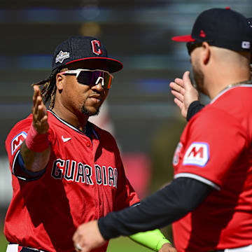 Sep 30, 2025; Cleveland, Ohio, USA; Cleveland Guardians third base Jose Ramírez (11) greets manager Stephen Vogt while being introduced before game one of the Wildcard round for the 2025 MLB playoffs against the Detroit Tigers at Progressive Field. Mandatory Credit: David Dermer-Imagn Images