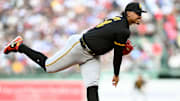 Aug 30, 2025; Boston, Massachusetts, USA; Pittsburgh Pirates starting pitcher Johan Oviedo (24) pitches against the Boston Red Sox during the first inning at Fenway Park. Mandatory Credit: Brian Fluharty-Imagn Images