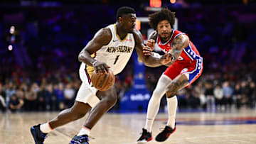 Mar 8, 2024; Philadelphia, Pennsylvania, USA; New Orleans Pelicans forward Zion Williamson (1) drives against Philadelphia 76ers guard Kelly Oubre Jr (9) in the third quarter at Wells Fargo Center. Mandatory Credit: Kyle Ross-Imagn Images