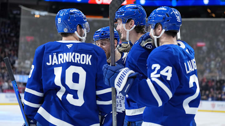 Apr 17, 2025; Toronto, Ontario, CAN; Toronto Maple Leafs defenseman Philippe Myers (51) scores a goal and celebrates with center Calle Jarnkrok (19) against the Detroit Red Wings during the third period at Scotiabank Arena. Mandatory Credit: Nick Turchiaro-Imagn Images