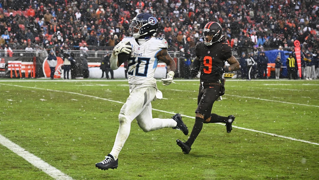 Dec 7, 2025; Cleveland, Ohio, USA; Tennessee Titans running back Tony Pollard (20) runs for a thirty-two yard touchdown against Cleveland Browns safety Grant Delpit (9) during the third quarter at Huntington Bank Field. Mandatory Credit: Ken Blaze-Imagn Images Dec 7, 2025; Cleveland, Ohio, USA; Tennessee Titans running back Tony Pollard (20) runs for a thirty-two yard touchdown against Cleveland Browns safety Grant Delpit (9) during the third quarter at Huntington Bank Field. Mandatory Credit: Ken Blaze-Imagn Images