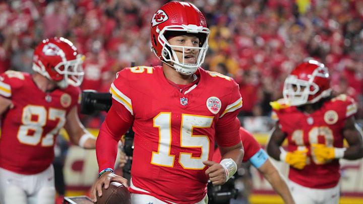 Sep 5, 2024; Kansas City, Missouri, USA; Kansas City Chiefs quarterback Patrick Mahomes (15) returns to the sidelines after a play against the Baltimore Ravens during the second half at GEHA Field at Arrowhead Stadium. Mandatory Credit: Denny Medley-Imagn Images