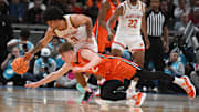 Mar 14, 2025; Indianapolis, IN, USA; Maryland Terrapins guard Ja'Kobi Gillespie (0) steals the ball from Illinois Fighting Illini guard Kasparas Jakucionis (32) during the first half at Gainbridge Fieldhouse. Mandatory Credit: Robert Goddin-Imagn Images