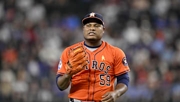 Sep 7, 2025; Arlington, Texas, USA; Houston Astros starting pitcher Framber Valdez (59) pitches against the Texas Rangers during the first inning at Globe Life Field. Mandatory Credit: Jerome Miron-Imagn Images