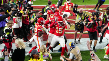 Feb 11, 2024; Paradise, Nevada, USA; Kansas City Chiefs quarterback Patrick Mahomes (15) celebrates after throwing the winning touchdown to wide receiver Mecole Hardman Jr. (12) during overtime against the San Francisco 49ers in Super Bowl LVIII at Allegiant Stadium. Mandatory Credit: Stephen R. Sylvanie-USA TODAY Sports